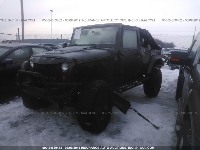 1J8GA59118L536608 - 2008 JEEP WRANGLER UNLIMITE SAHARA GREEN photo 2