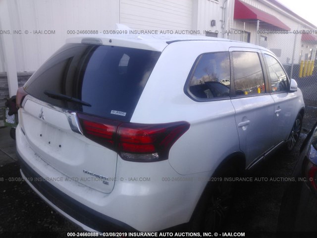 JA4AZ3A33JZ041959 - 2018 MITSUBISHI OUTLANDER SE/SEL WHITE photo 4