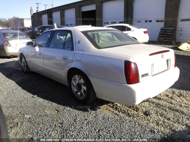 1G6KF5793YU283879 - 2000 CADILLAC DEVILLE DTS WHITE photo 3