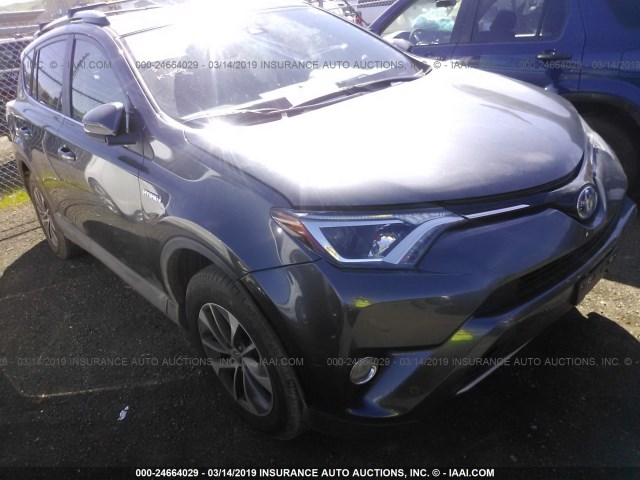 JTMRJREV2HD124286 - 2017 TOYOTA RAV4 HV LE/XLE GRAY photo 1