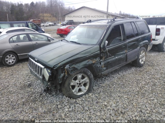 1J4GZ58S1VC542537 - 1997 JEEP GRAND CHEROKEE LAREDO/TSI GREEN photo 2