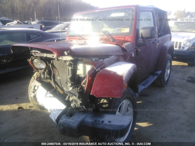 1J4FA54199L784613 - 2009 JEEP WRANGLER SAHARA MAROON photo 2