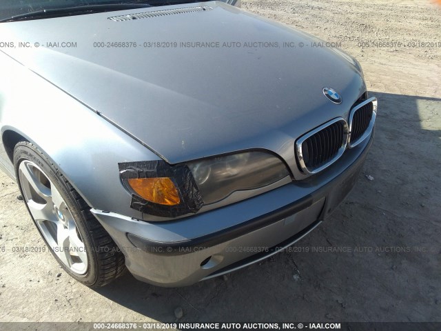 WBAAZ33484KP86938 - 2004 BMW 325 IS SULEV SILVER photo 6