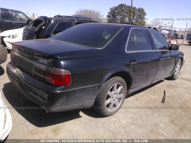 1G6KY5499YU273792 - 2000 CADILLAC SEVILLE STS BLACK photo 4