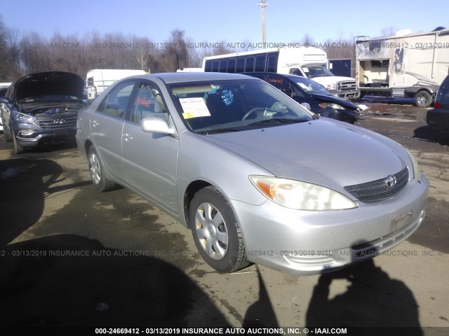 4T1BE32K44U928494 - 2004 TOYOTA CAMRY LE/XLE/SE SILVER photo 1