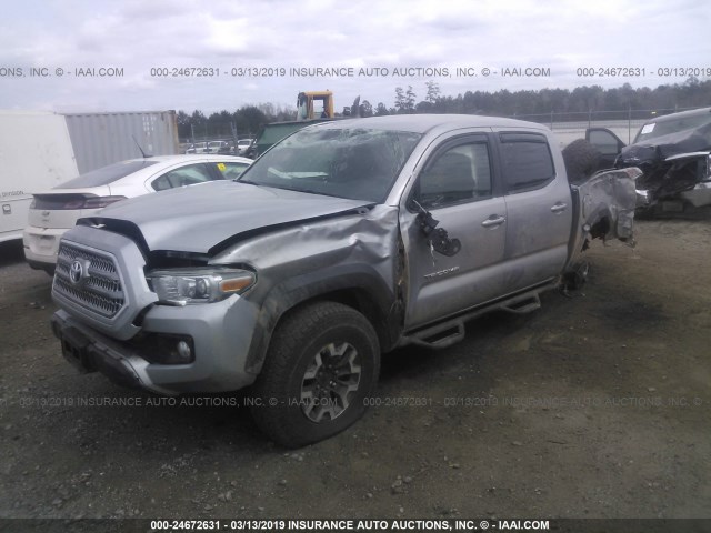 5TFCZ5AN7GX032004 - 2016 TOYOTA TACOMA DBL CAB/SR/SR5/TRD SPT/OR SILVER photo 2