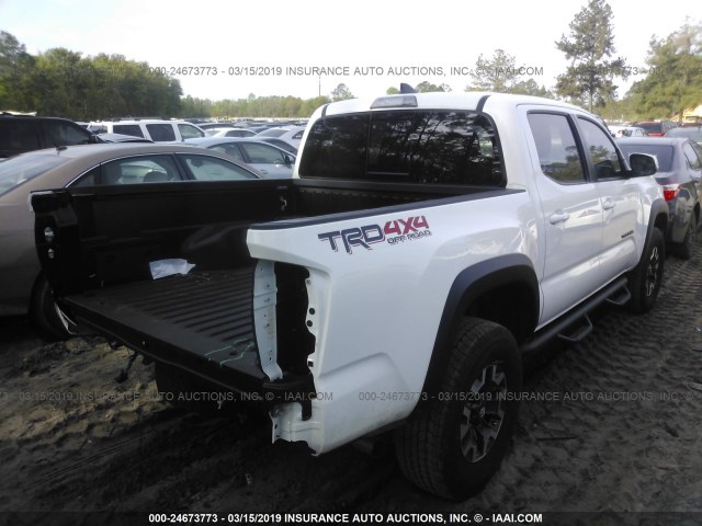 5TFCZ5AN7HX114851 - 2017 TOYOTA TACOMA DBL CAB/SR/TRDSPT/OR/PRO WHITE photo 4