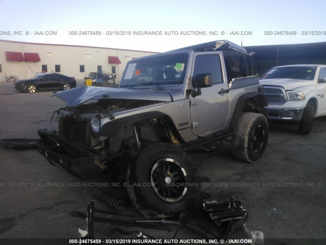 1C4AJWAG8DL665412 - 2013 JEEP WRANGLER SPORT SILVER photo 2