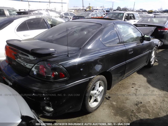 1G2NV12E0YM838754 - 2000 PONTIAC GRAND AM GT1 BLACK photo 4