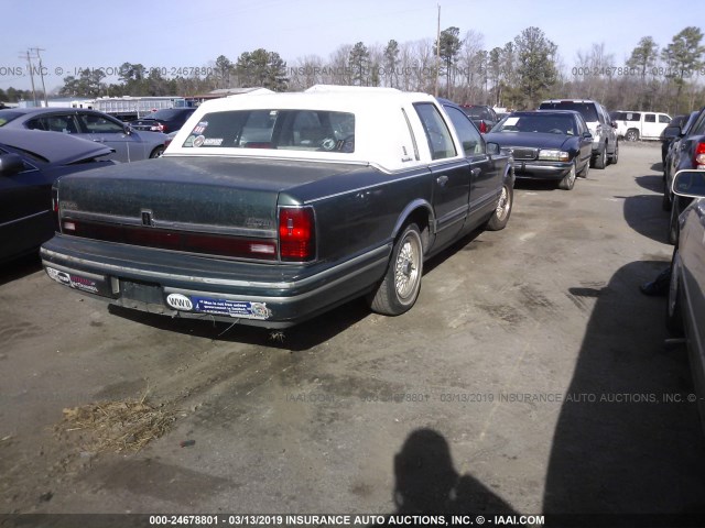 1LNLM82W0RY711886 - 1994 LINCOLN TOWN CAR SIGNATURE/TOURNAMENT GREEN photo 4