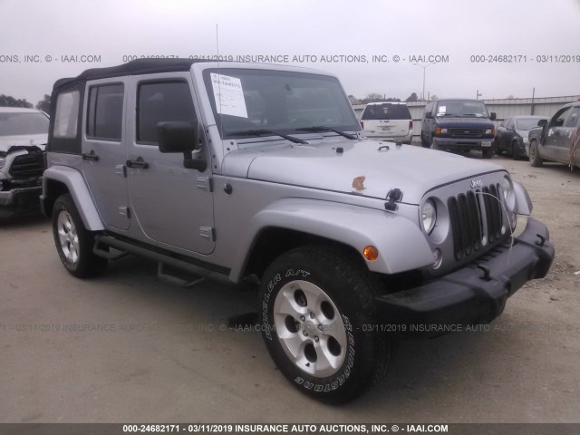 1C4BJWDG2FL687893 - 2015 JEEP WRANGLER UNLIMITE SPORT SILVER photo 1