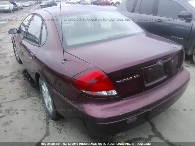 1FAFP56U65A310934 - 2005 FORD TAURUS SEL RED photo 3