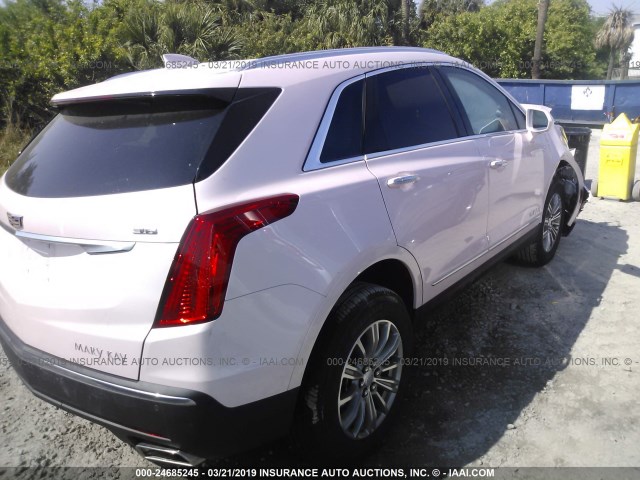 1GYKNCRS8KZ136949 - 2019 CADILLAC XT5 LUXURY PINK photo 4