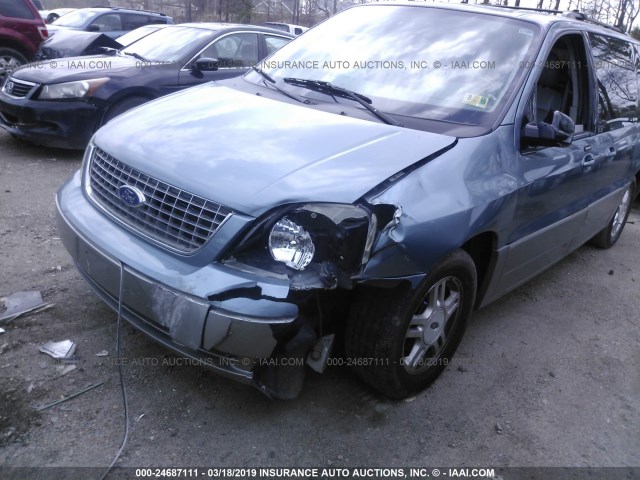 2FMDA58214BA29752 - 2004 FORD FREESTAR LIMITED BLUE photo 6