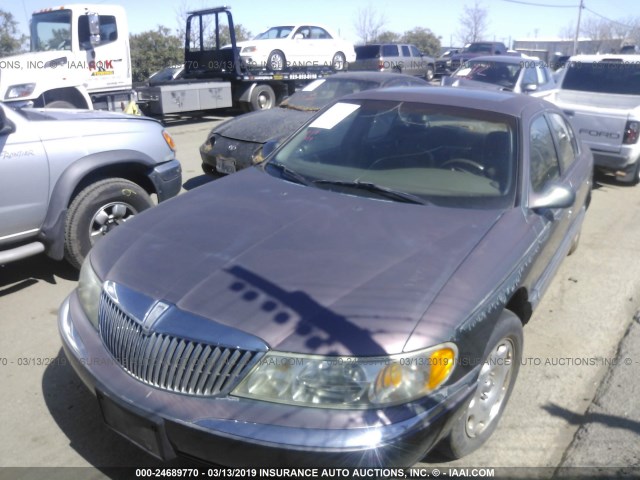 1LNLM97V9WY603056 - 1998 LINCOLN CONTINENTAL  GREEN photo 2