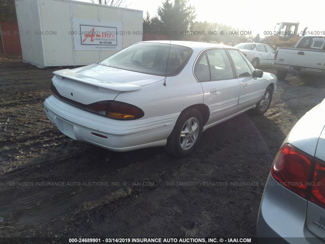 1G2HX52K8XH249124 - 1999 PONTIAC BONNEVILLE SE WHITE photo 4