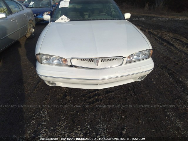 1G2HX52K8XH249124 - 1999 PONTIAC BONNEVILLE SE WHITE photo 6