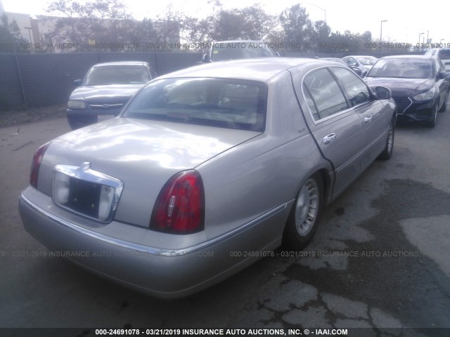 1LNHM81W0XY633601 - 1999 LINCOLN TOWN CAR EXECUTIVE GRAY photo 4