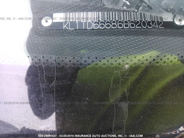 KL1TD66686B620342 - 2006 CHEVROLET AVEO LS ORANGE photo 9