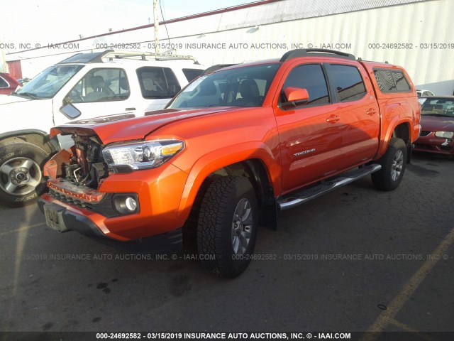 3TMCZ5AN3GM014962 - 2016 TOYOTA TACOMA DBL CAB/SR/SR5/TRD SPT/OR ORANGE photo 2