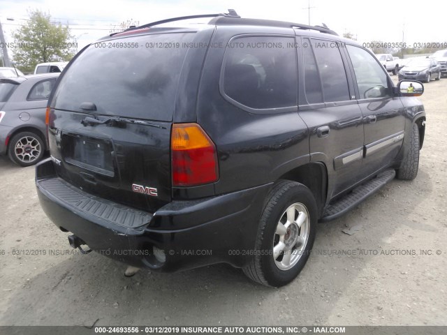 1GKDS13S742125736 - 2004 GMC ENVOY BLACK photo 4