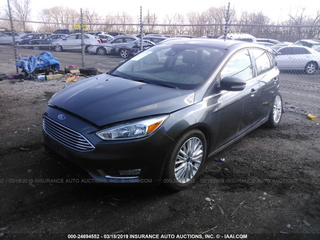 1FADP3N29HL309975 - 2017 FORD FOCUS TITANIUM GRAY photo 2