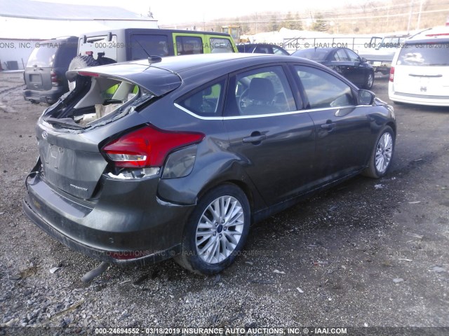 1FADP3N29HL309975 - 2017 FORD FOCUS TITANIUM GRAY photo 4