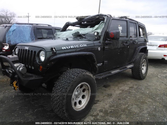 1J4HA6H19BL525117 - 2011 JEEP WRANGLER UNLIMITE RUBICON GREEN photo 2