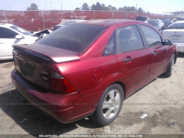 1FAFP34N85W112956 - 2005 FORD FOCUS ZX4 RED photo 4