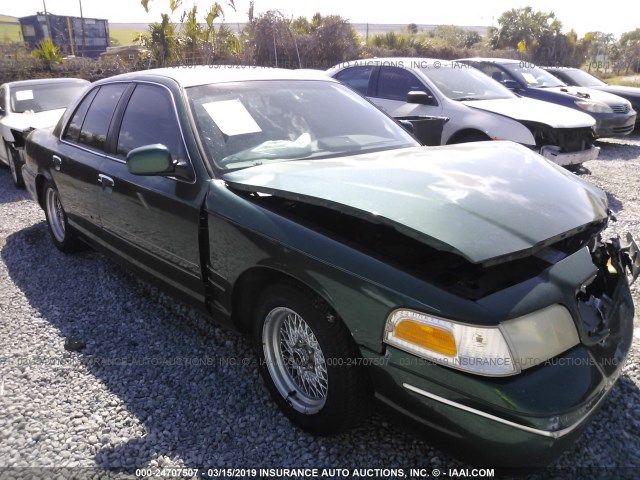 2FAFP74W5YX123938 - 2000 FORD CROWN VICTORIA LX GREEN photo 1