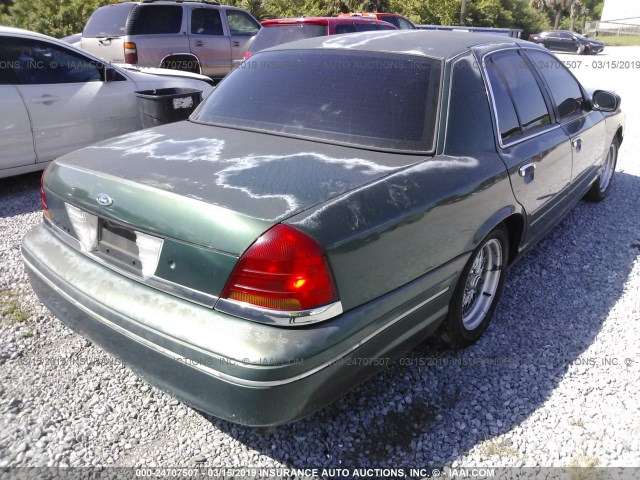 2FAFP74W5YX123938 - 2000 FORD CROWN VICTORIA LX GREEN photo 4