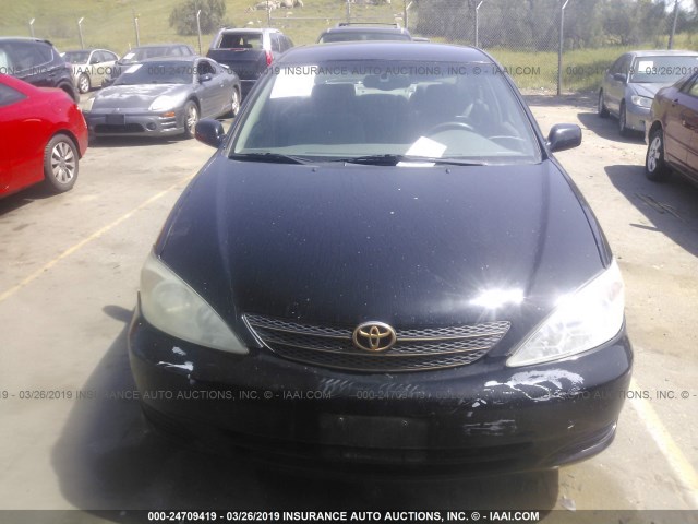 4T1BF32K82U009821 - 2002 TOYOTA CAMRY LE/XLE/SE BLACK photo 6