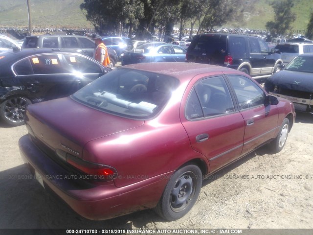 1Y1SK5287SZ085139 - 1995 GEO PRIZM LSI RED photo 4