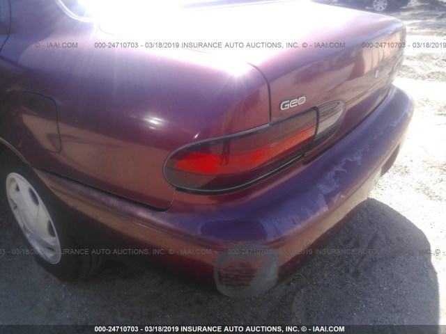 1Y1SK5287SZ085139 - 1995 GEO PRIZM LSI RED photo 6