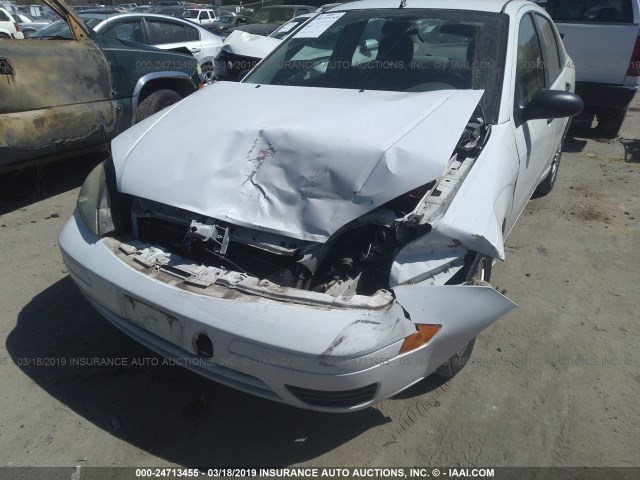 1FAFP34N25W187149 - 2005 FORD FOCUS ZX4 WHITE photo 6