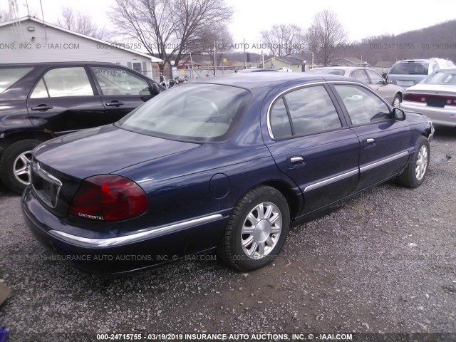 1LNHM97V72Y678564 - 2002 LINCOLN CONTINENTAL  BLUE photo 4