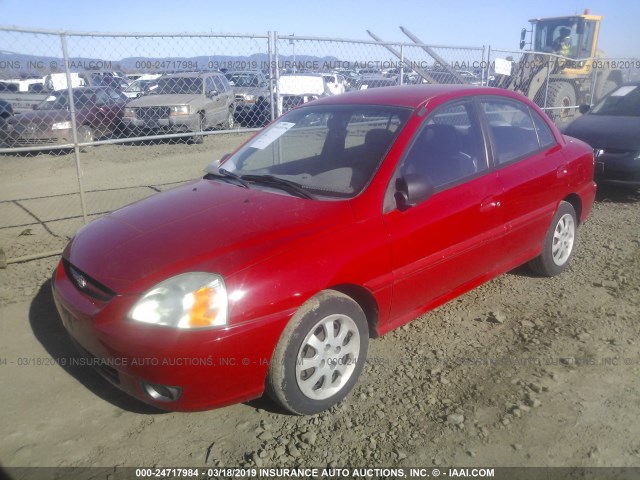 KNADC125236259949 - 2003 KIA RIO RED photo 2