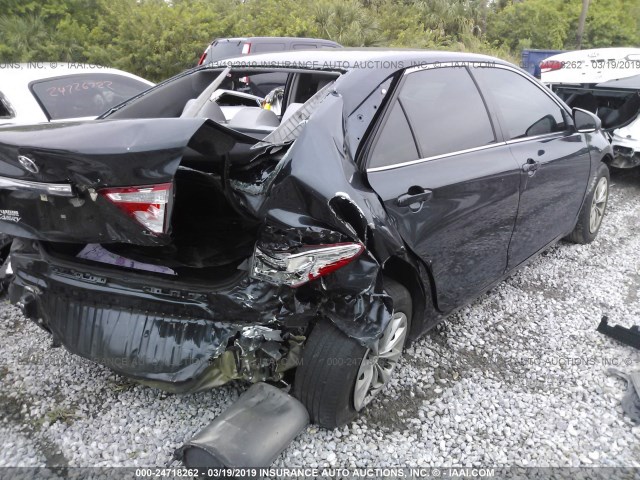 4T1BF1FK4HU318290 - 2017 TOYOTA CAMRY LE/XLE/SE/XSE BLACK photo 4
