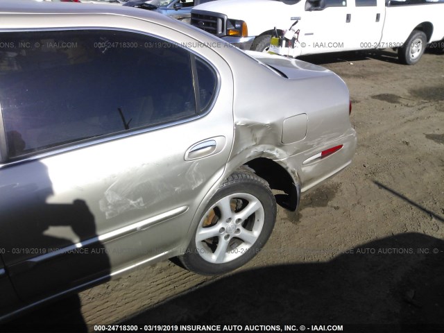 JN1CA31DXYT557718 - 2000 NISSAN MAXIMA GLE/GXE/SE GOLD photo 6