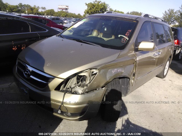 KNDMC233276023832 - 2007 HYUNDAI ENTOURAGE GLS/SE/LIMITED GOLD photo 2