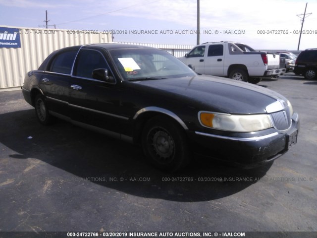 1LNHM81W5XY660941 - 1999 LINCOLN TOWN CAR EXECUTIVE BLACK photo 1