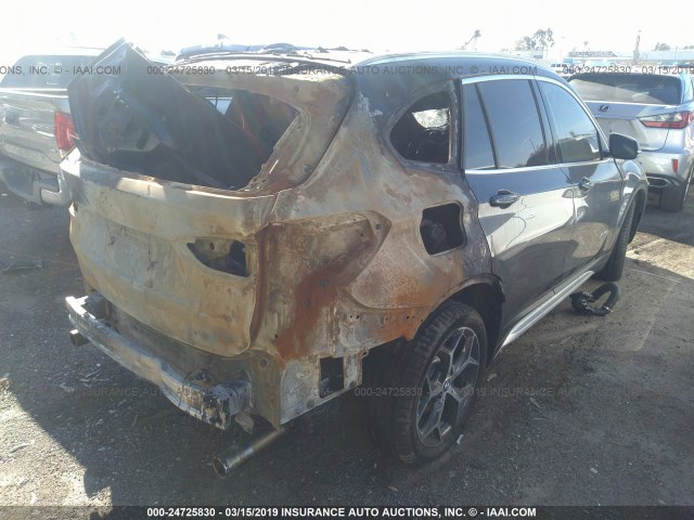 WBXHT3C32H5F68417 - 2017 BMW X1 XDRIVE28I ნაცრისფერი ფოტო 4