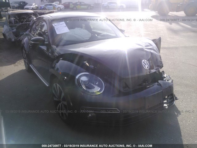 3VWVT7AT4EM612525 - 2014 VOLKSWAGEN BEETLE TURBO BLACK photo 1