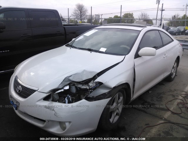 4T1CE38P54U799818 - 2004 TOYOTA CAMRY SOLARA SE/SLE WHITE photo 2