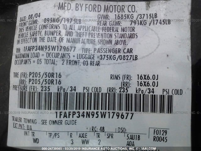 1FAFP34N95W179677 - 2005 FORD FOCUS ZX4 BLACK photo 9