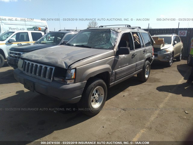 1J4GZ58Y9VC769348 - 1997 JEEP GRAND CHEROKEE LAREDO/TSI GOLD photo 2