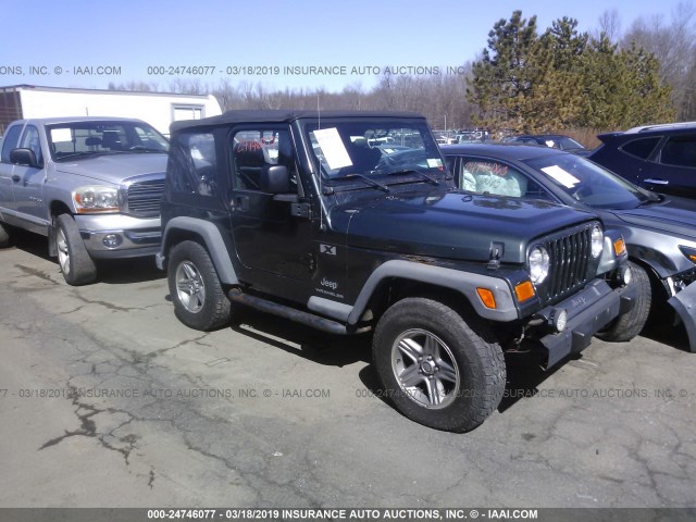 1J4FA39S33P357241 - 2003 JEEP WRANGLER COMMANDO/X GREEN photo 1