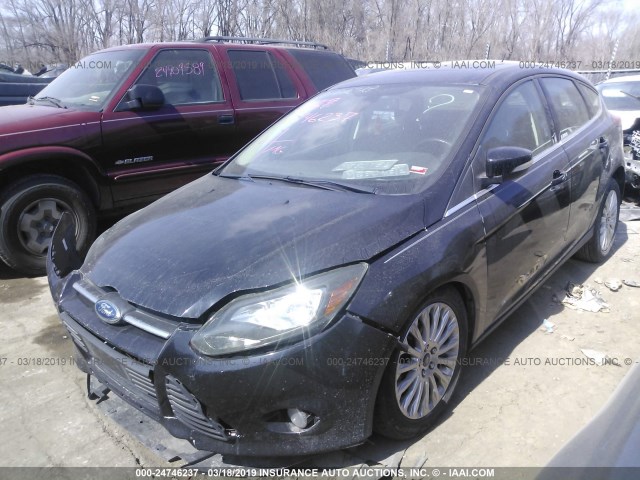 1FAHP3N28CL210042 - 2012 FORD FOCUS TITANIUM BLACK photo 2