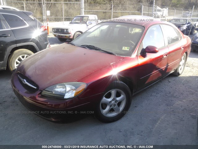 1FAFP55U3YG121323 - 2000 FORD TAURUS SES RED photo 2