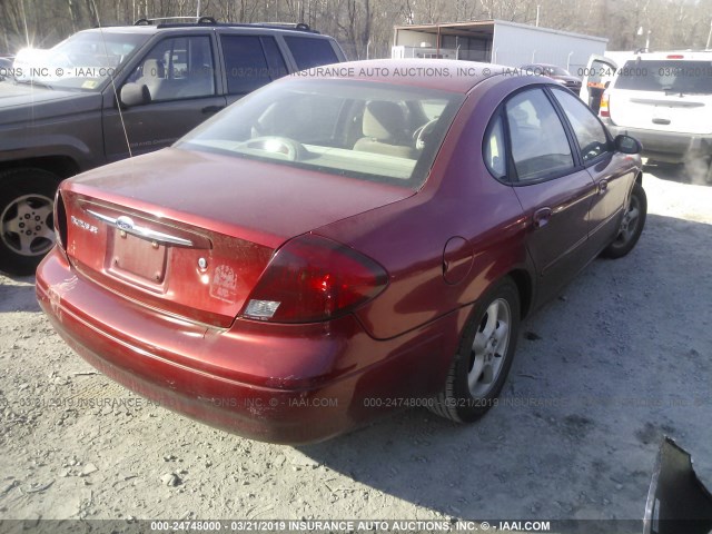 1FAFP55U3YG121323 - 2000 FORD TAURUS SES RED photo 4